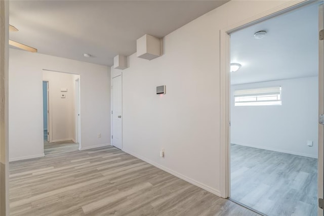 hallway featuring light hardwood / wood-style flooring