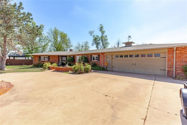 single story home with a garage