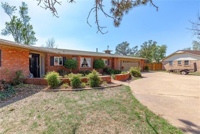 ranch-style home with a garage