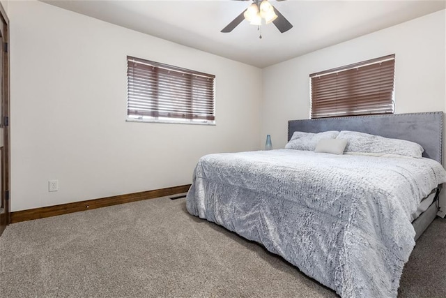 bedroom featuring ceiling fan and carpet flooring