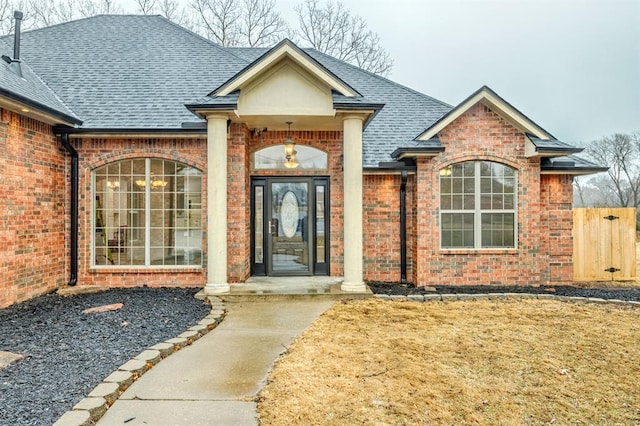 entrance to property with a yard