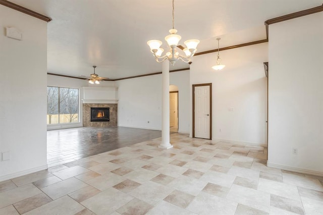 unfurnished living room with crown molding and ceiling fan with notable chandelier