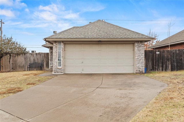 garage with a yard