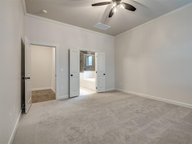 unfurnished bedroom with ornamental molding, light carpet, ceiling fan, and ensuite bath