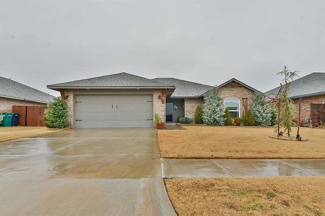 ranch-style house featuring a garage