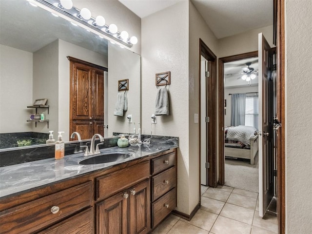 bathroom with vanity, tile patterned floors, and ceiling fan