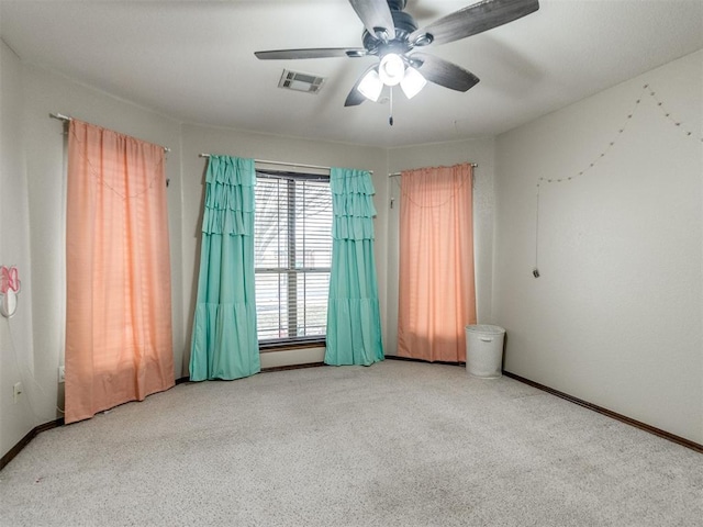 unfurnished room featuring ceiling fan