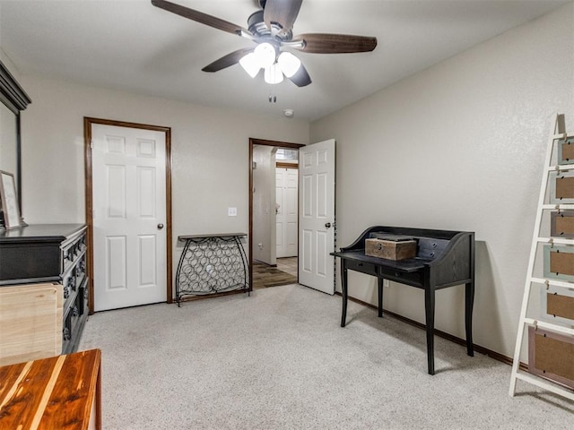 interior space featuring ceiling fan