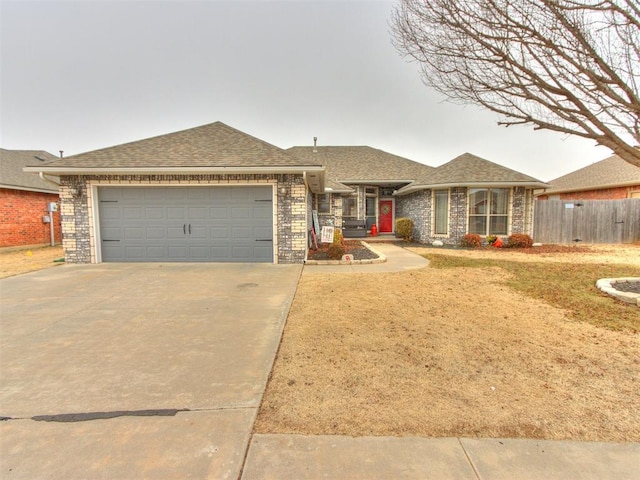 ranch-style home with a garage