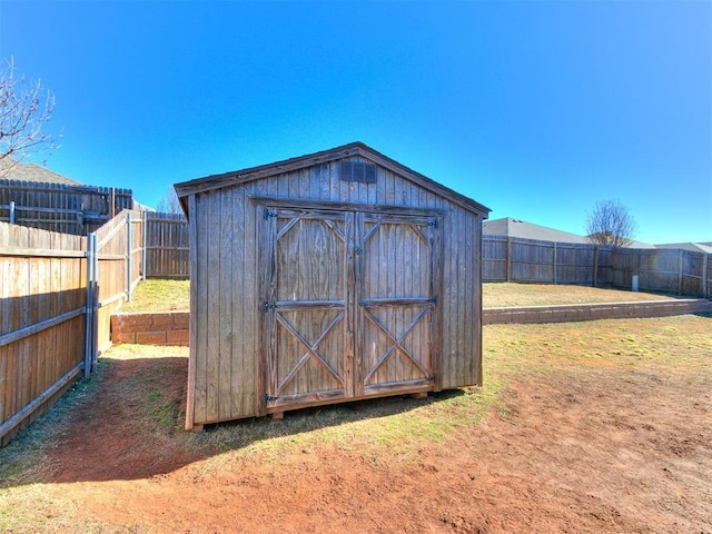 view of outdoor structure with a lawn