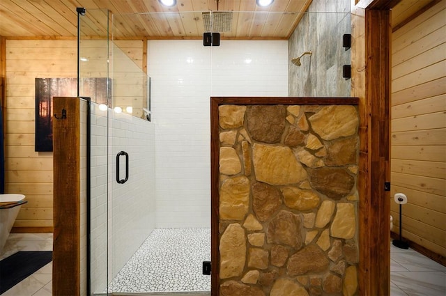 bathroom with wood ceiling, toilet, an enclosed shower, and wood walls