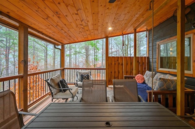 sunroom / solarium with wood ceiling