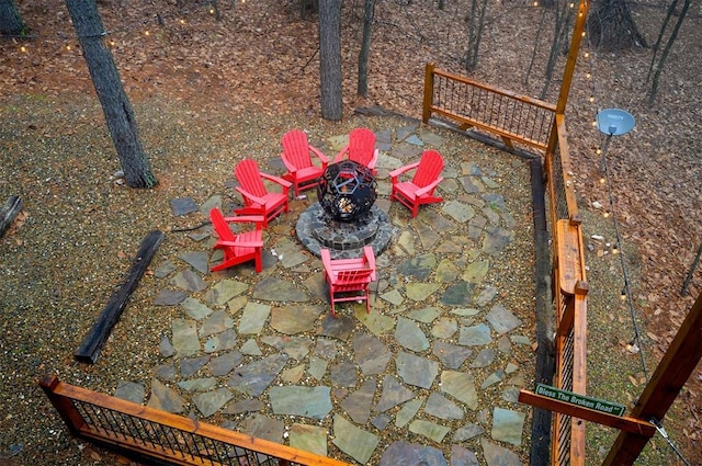 exterior details with an outdoor fire pit