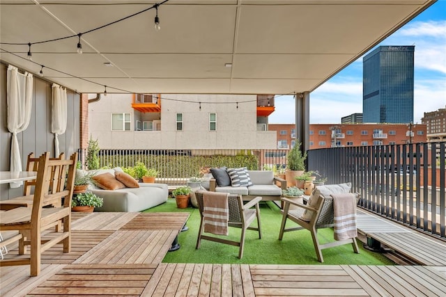 wooden deck with outdoor lounge area