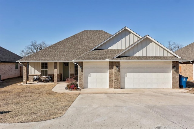 view of front of home with a garage and covered porch