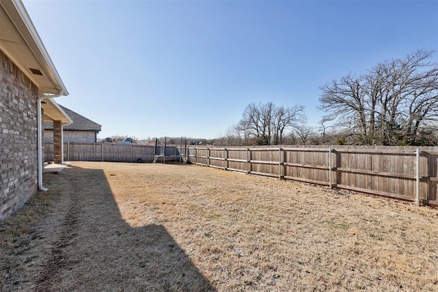 view of yard featuring a trampoline