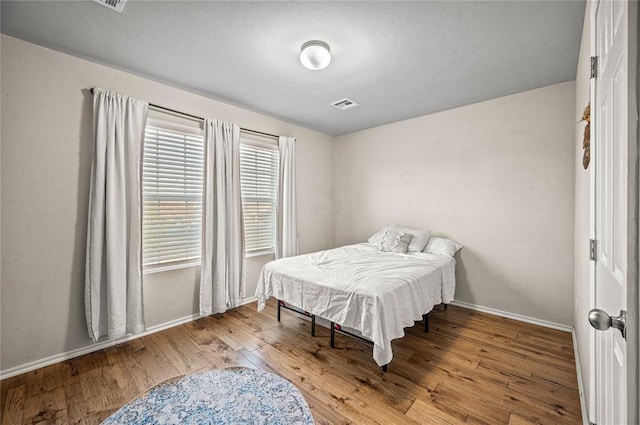 bedroom featuring light wood-type flooring