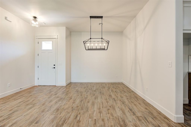 foyer entrance featuring light hardwood / wood-style flooring