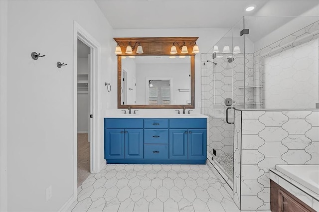 bathroom with vanity and walk in shower