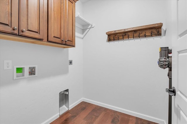 laundry area with cabinets, washer hookup, hookup for an electric dryer, and dark hardwood / wood-style flooring