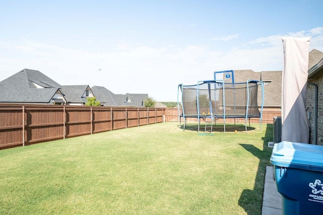 view of yard featuring a trampoline