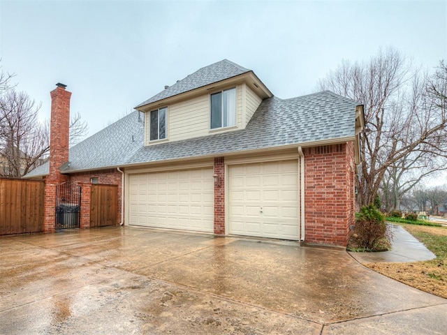 view of property exterior with a garage