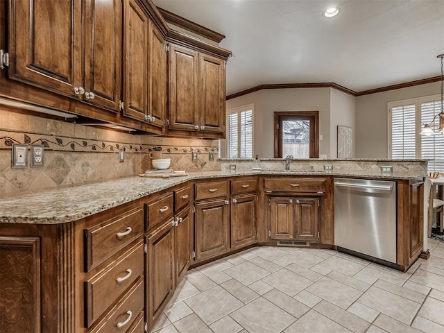 kitchen with sink, ornamental molding, kitchen peninsula, and dishwasher