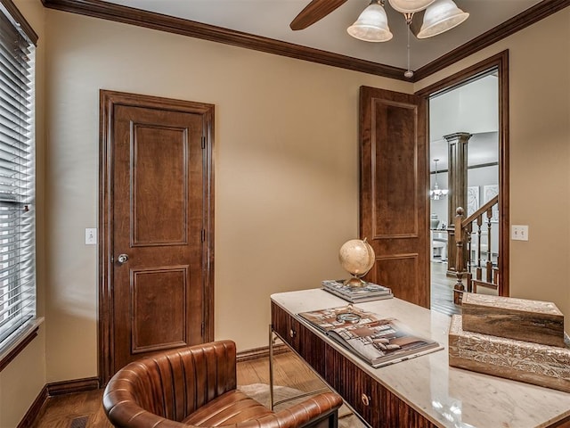 office area with dark wood-type flooring, ornamental molding, decorative columns, and ceiling fan