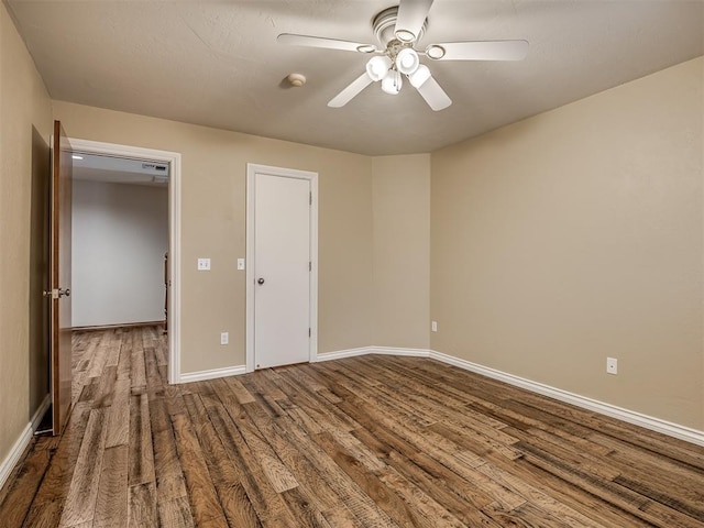 unfurnished bedroom with hardwood / wood-style flooring and ceiling fan