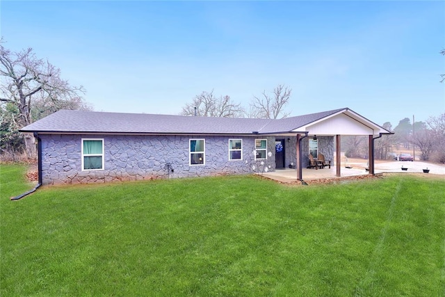 back of house with a patio and a yard