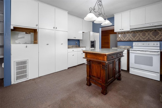 kitchen featuring white cabinetry, white appliances, decorative light fixtures, and a center island