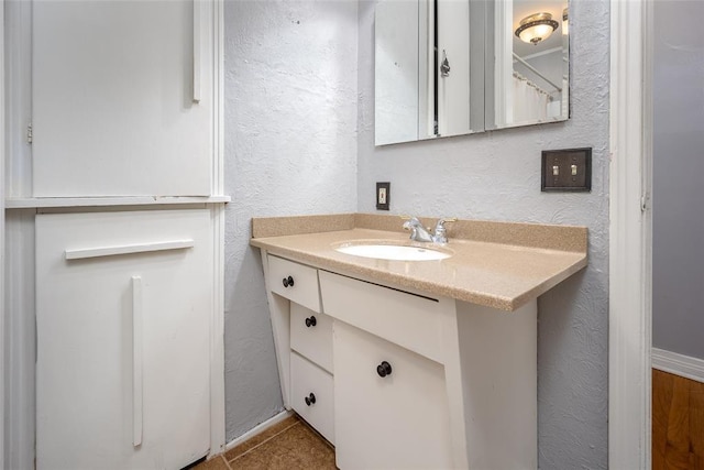 bathroom featuring vanity and tile patterned floors