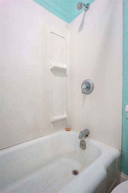 bathroom featuring bathing tub / shower combination