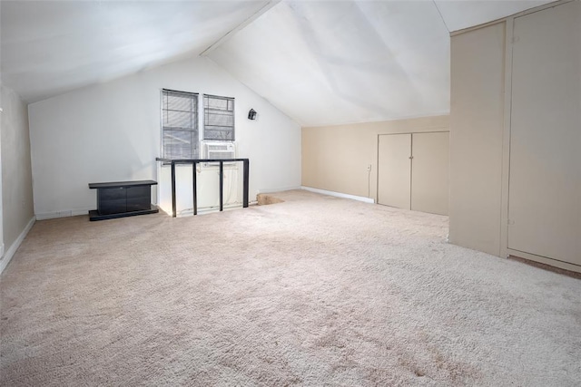 bonus room featuring cooling unit, carpet floors, and vaulted ceiling