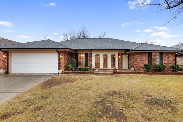 single story home featuring a garage and a front lawn