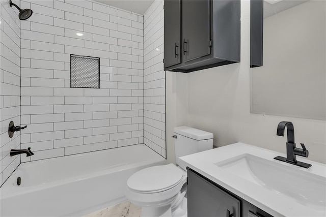 full bathroom with vanity, toilet, and tiled shower / bath combo