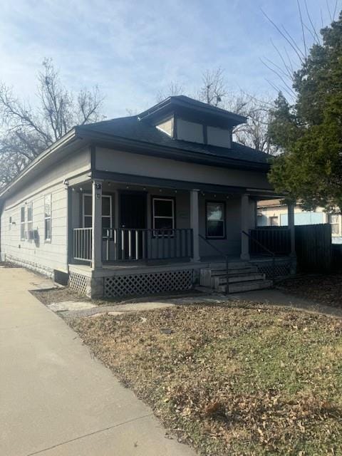 view of home's exterior with covered porch