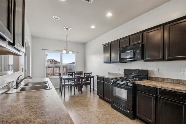 kitchen featuring sink, dark brown cabinets, black appliances, decorative light fixtures, and a chandelier