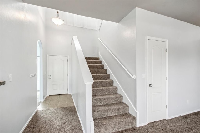 stairway with carpet floors