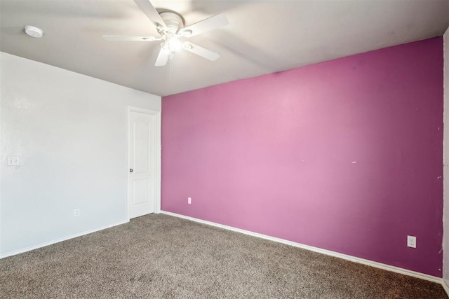 carpeted empty room with ceiling fan