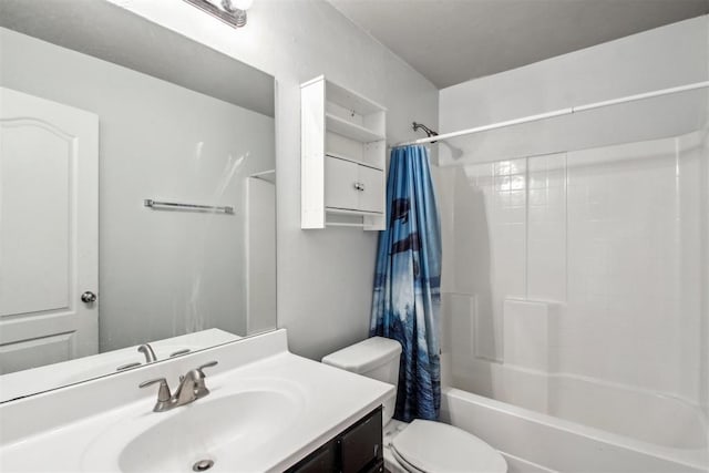 full bathroom with vanity, shower / tub combo with curtain, and toilet