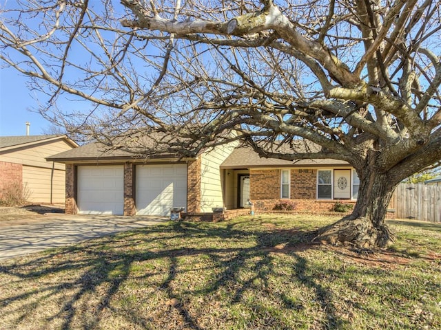 single story home featuring a garage and a front lawn