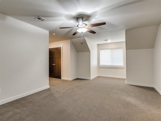 8909 NW 129th St, Oklahoma City, OK 73142 - additional living space with a ceiling fan, carpet, and baseboards