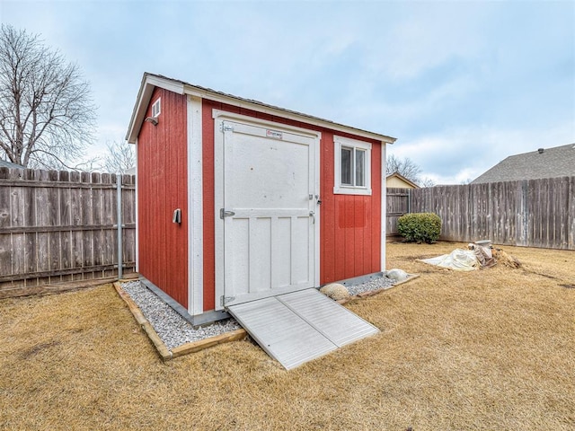 view of outdoor structure with a yard