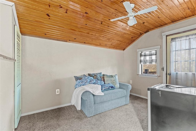 living area featuring ceiling fan, lofted ceiling, light carpet, and wooden ceiling