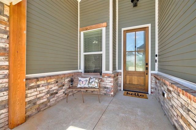 entrance to property with a porch