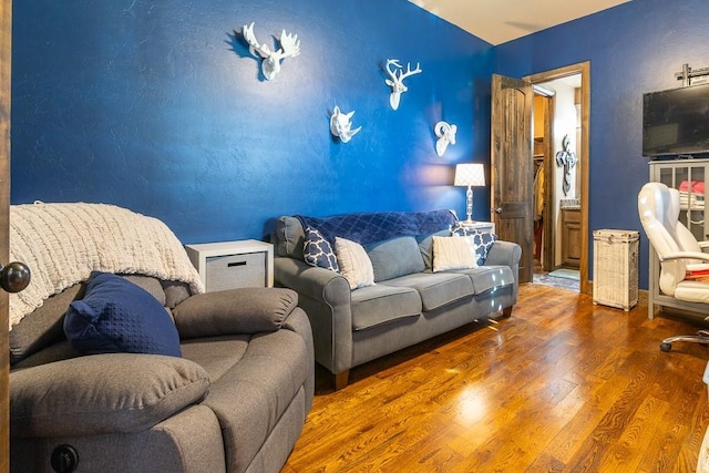 living room with dark wood-type flooring