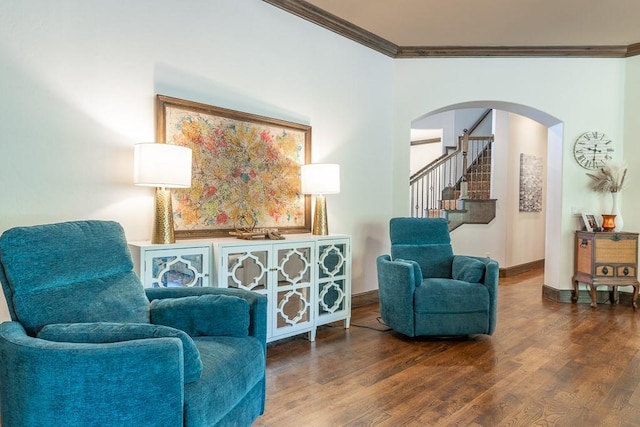 sitting room featuring crown molding and wood-type flooring