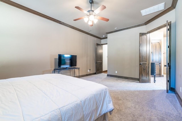 bedroom featuring ornamental molding, light carpet, and ceiling fan