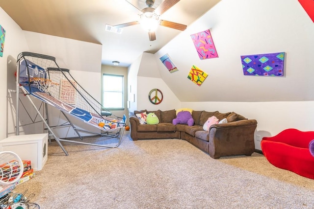 recreation room with light carpet, vaulted ceiling, and ceiling fan